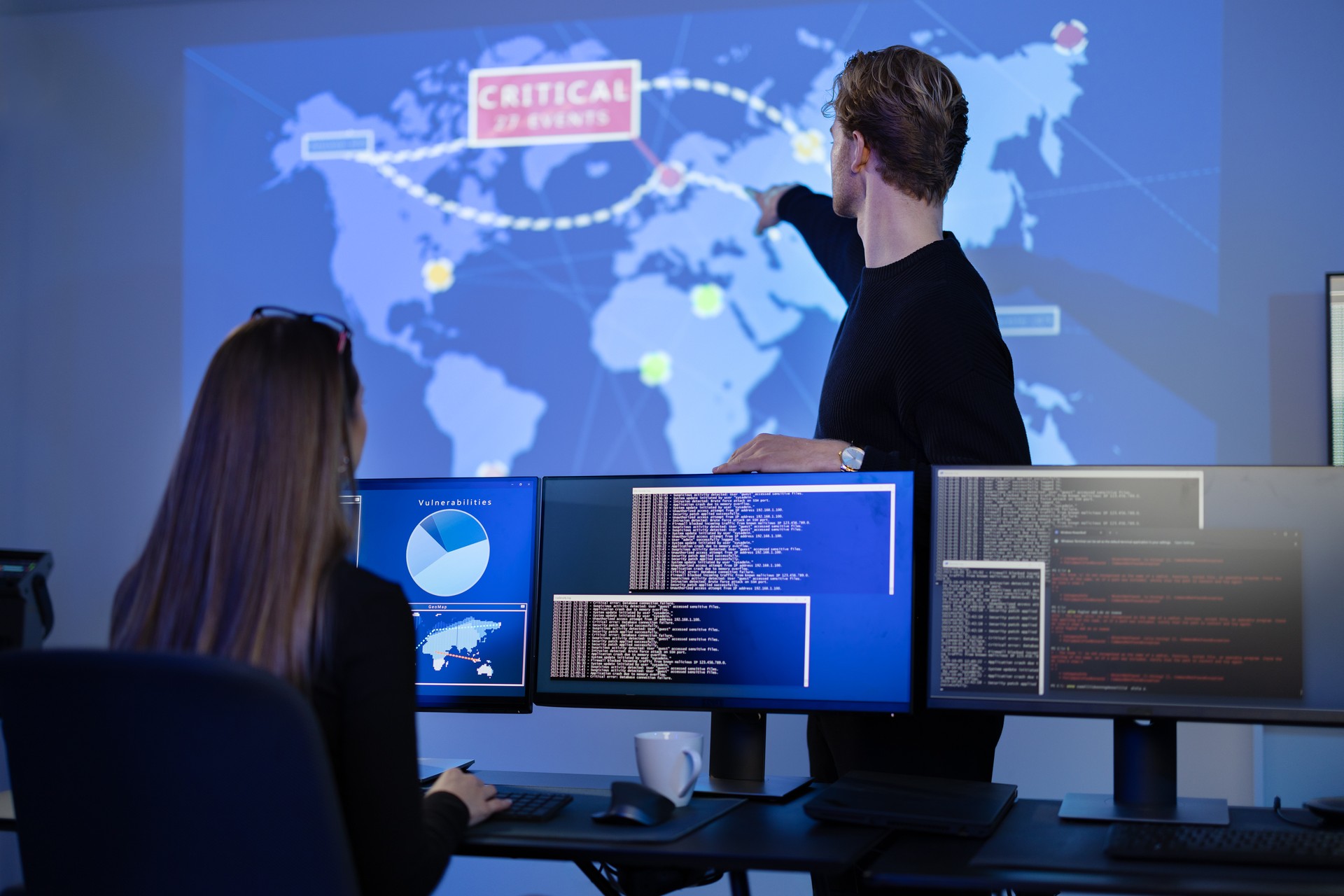 Cyber security team working in a Cyber Security Operations Center SOC to protect datacenter from security breach